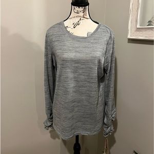 Lightweight long sleeve with scrunched forearms.